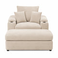 Sofá chaise longue de tela acanalada beige con cojines